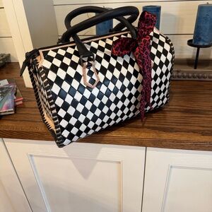 Elegant Black and White Checkered Satchel with Red Bow